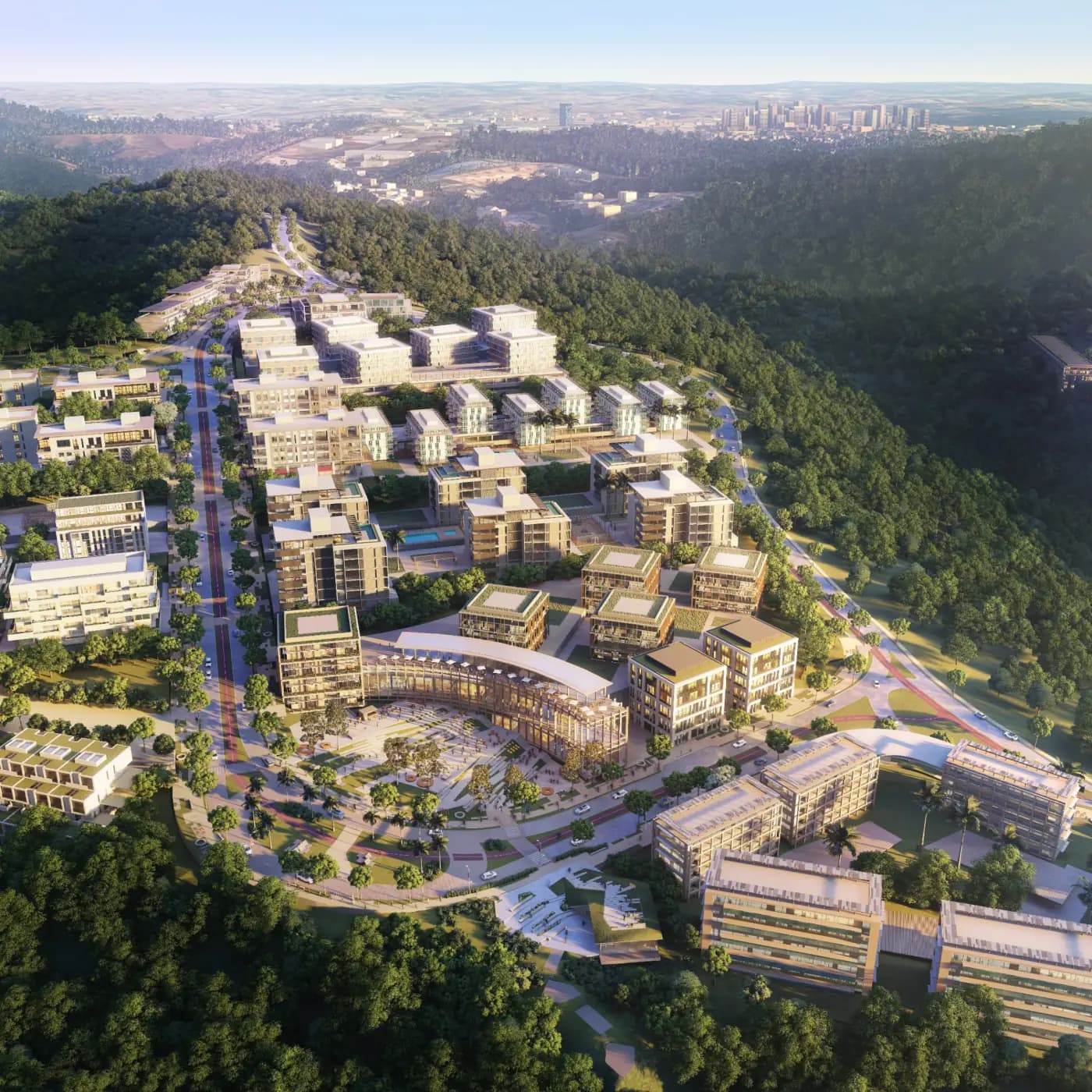 Centralidade Urbe vista do alto: quadras de edifícios residenciais e comerciais ao longo de uma avenida arborizada, com mata nativa em volta e a cidade no horizonte.